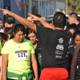 Rob Isquierdo points the way prior to the start of the 5K run.